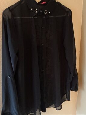 Black Woman’s Sheer Button-Down Blouse with Studded Collar
